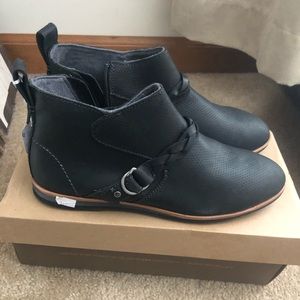 Olukai Black leather booties.  Size 7 never worn.
